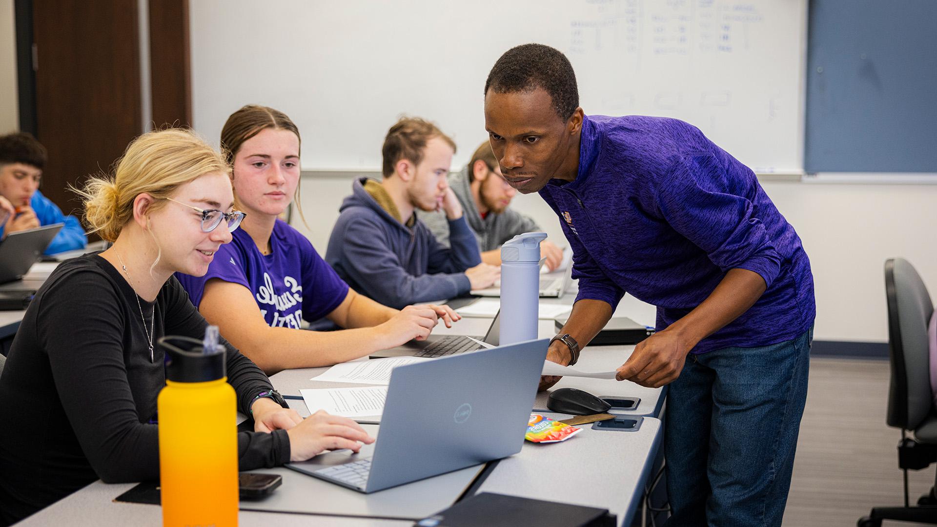 Maxwell Omwenga teaching a class